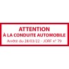 Panneau rouge et blanc lisible: “ATTENTION À LA CONDUITE AUTOMOBILE” avec texte secondaire “Arrêté du 28/03/22 - JORF n° 79”